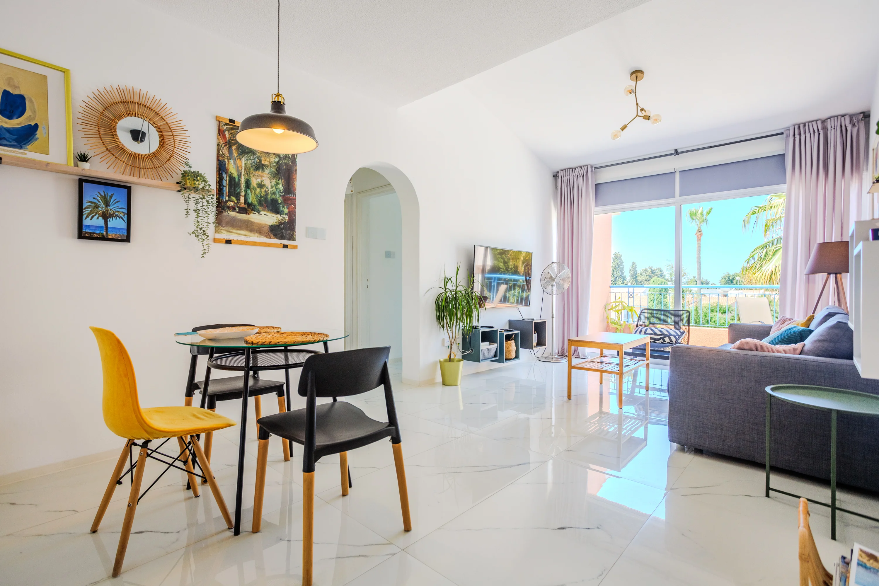 Open-plan living and dining area at Paradise Gardens 3