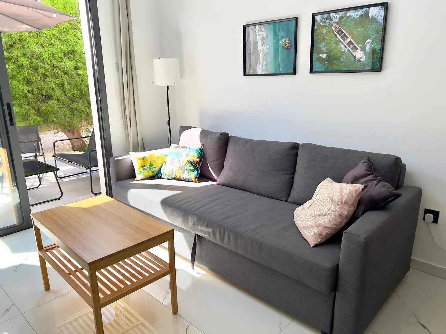Sofa bed beside the garden doors